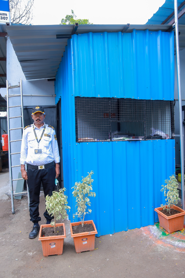 Security personnel guarding the kitchen facility